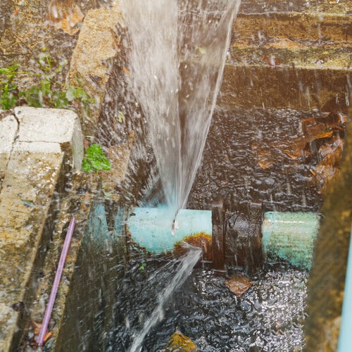 water line laying in a ditch