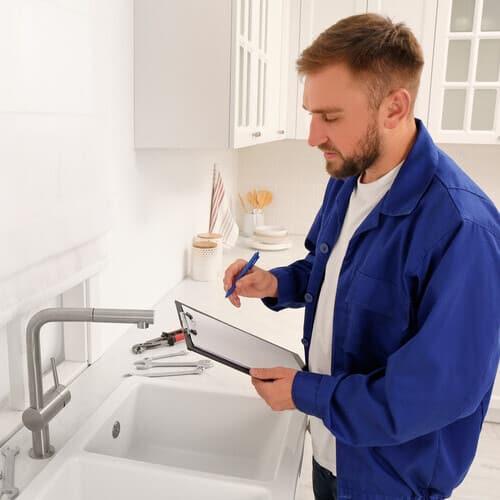 plumber performing an inspection